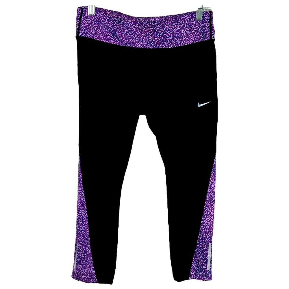 Nike Dri-Fit sports capri leggings. Size Medium. Purple and black